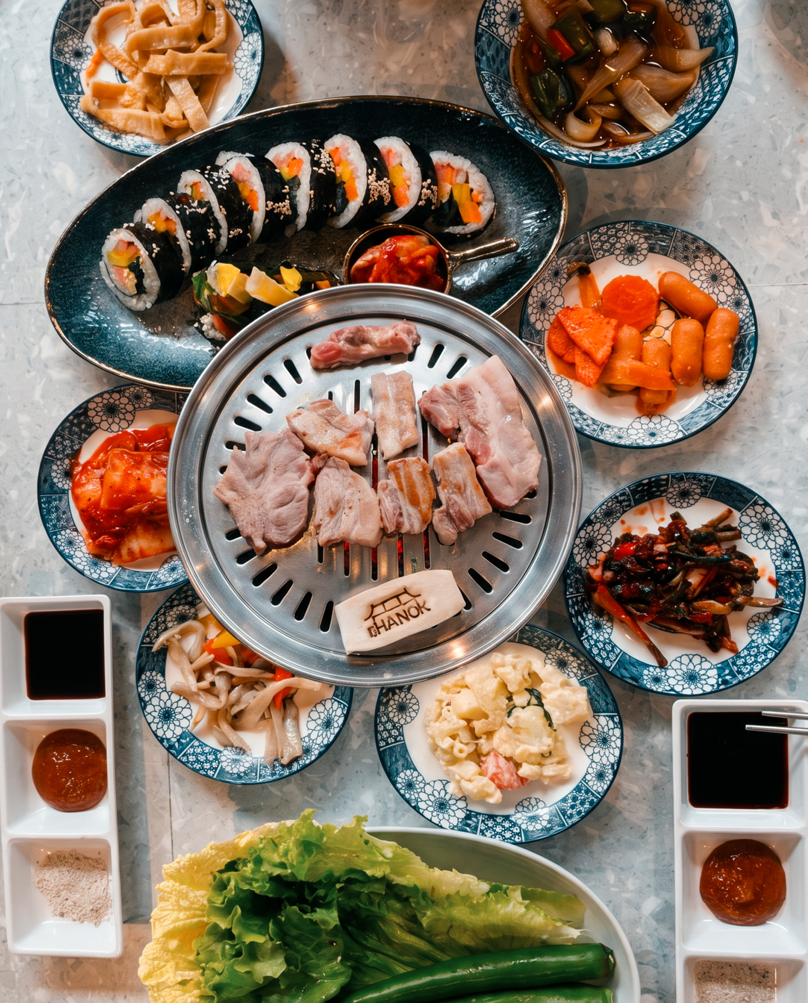 Korean BBQ restaurant Pattaya Naklua grill table banchan